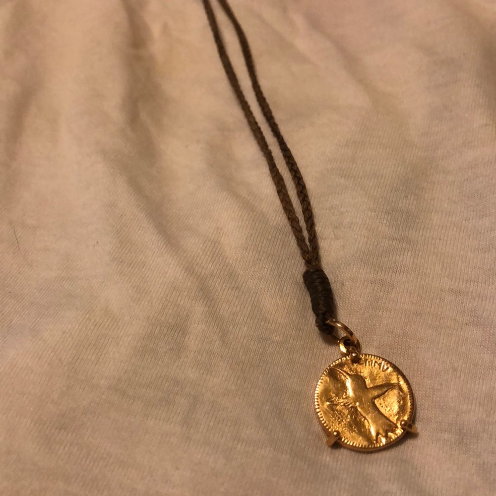Freecity small gold sparrow coin